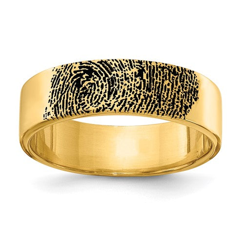 Yellow gold fingerprint ring featuring intricate engraved design, handcrafted jewelry by Solomon Jewelers.