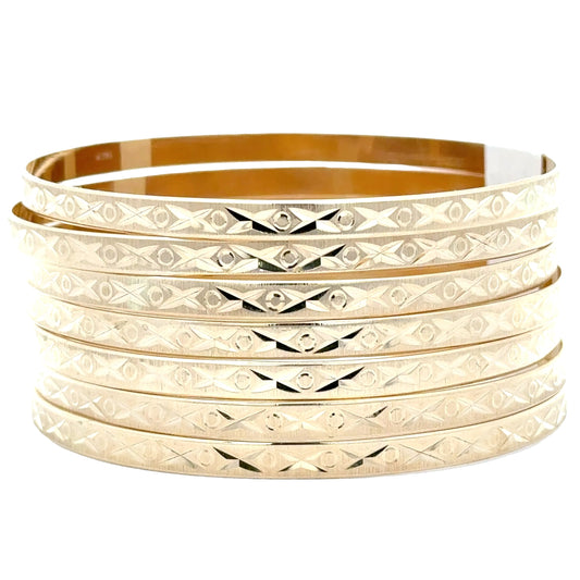 10Karat solid yellow gold Semanario 7 day bangle set.