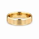 14 karat brushed yellow gold wedding band with polished beveled edges available at Solomon Jeweler.