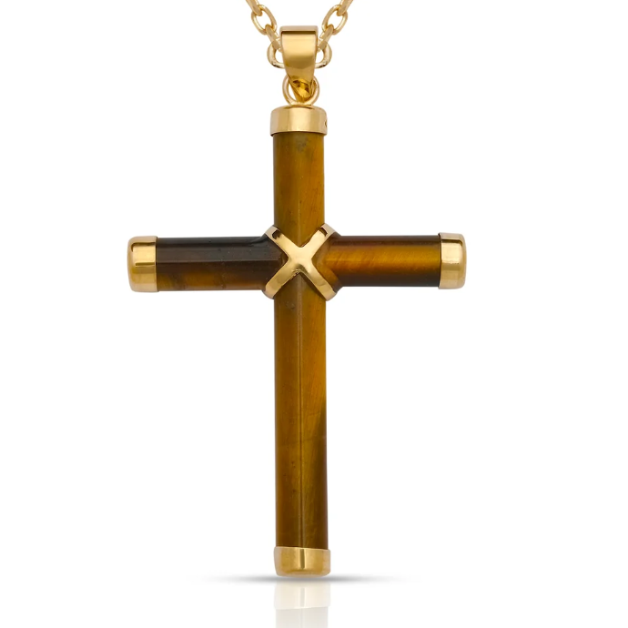 A gold cross pendant necklace featuring a tiger's eye inlay with a central gold Chi-Rho symbol, shown on a white background.