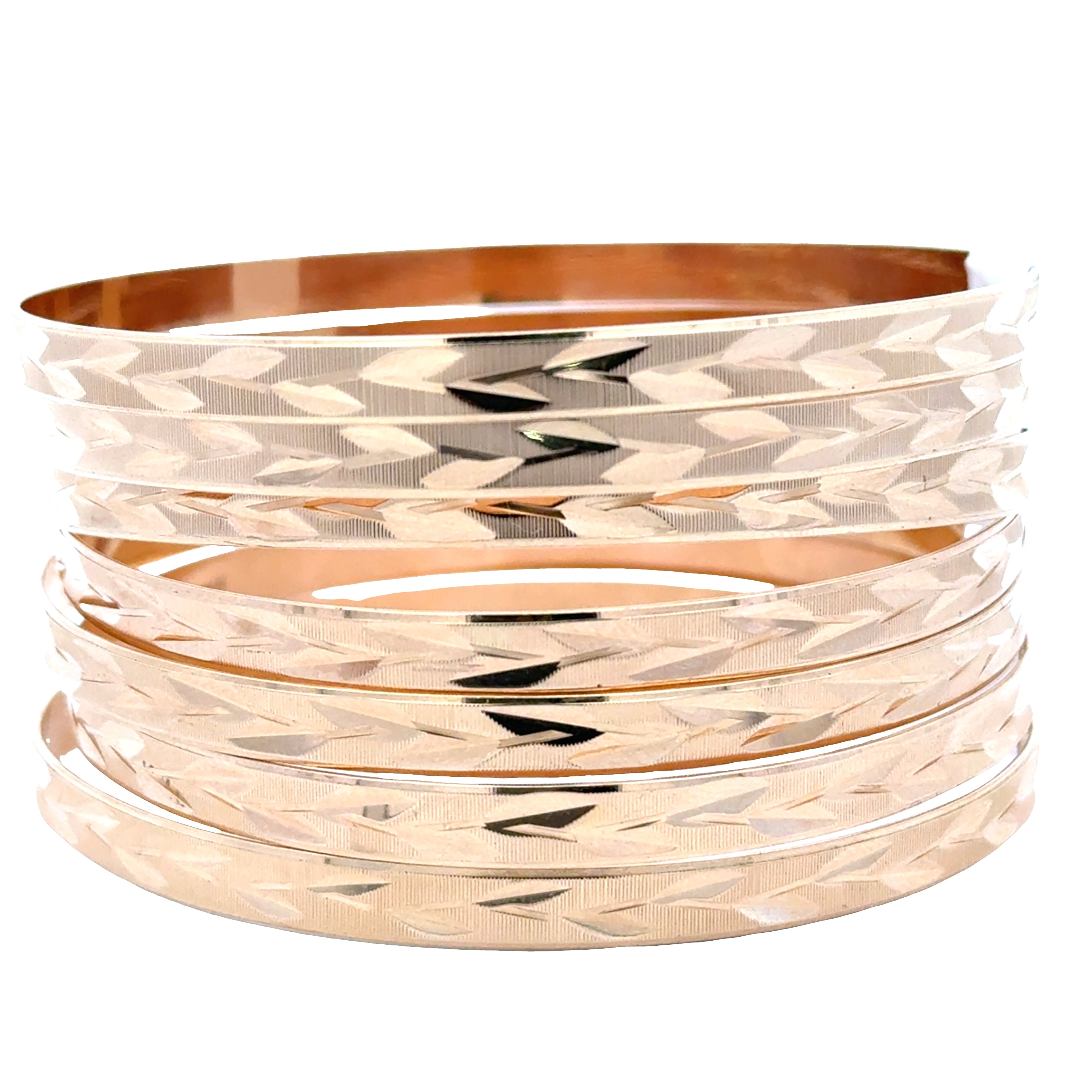 Traditional yellow gold stackable semanario bangle from Solomon Jeweler.