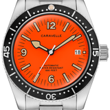 A Caravelle automatic dive watch with a vibrant orange dial, black rotating bezel, and a brushed stainless steel link bracelet.