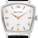 Bulova watch with a silver-toned rectangular case, white dial, rose gold-tone hands and markers, and a black textured leather strap.