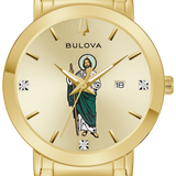 A gold-tone Bulova stainless steel watch with a gold dial and a central religious icon illustration of Jesus. The watch features a matching gold-tone metal link bracelet, gold-tone hands and markers, and crystal accents at the 3 and 9 o'clock positions.