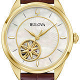 A Bulova wristwatch with a gold-tone case, mother-of-pearl dial, and a brown alligator leather strap, shown on a solid white background.