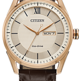 Citizen watch with brown leather strap and rose gold case on white background