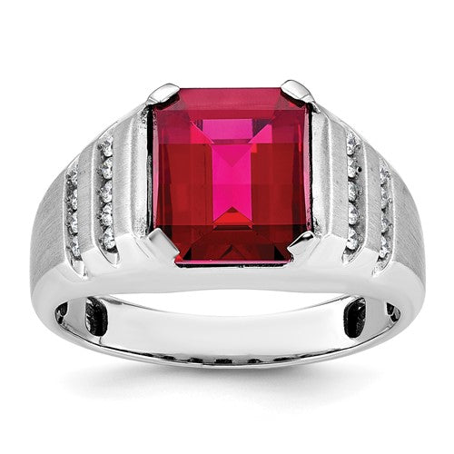 14k white gold men's ring with a central ruby and diamond accents, featuring a detailed band design.