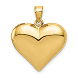 14K gold puffed heart pendant with polished finish, jewelry charm from Solomon Jewelers, featuring a 3-D design.