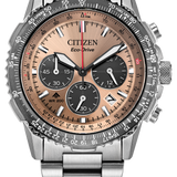 Citizen Eco-Drive chronograph watch with a stainless steel link bracelet, featuring a champagne-gold dial, three subdials, and a rotating black tachymeter bezel.
