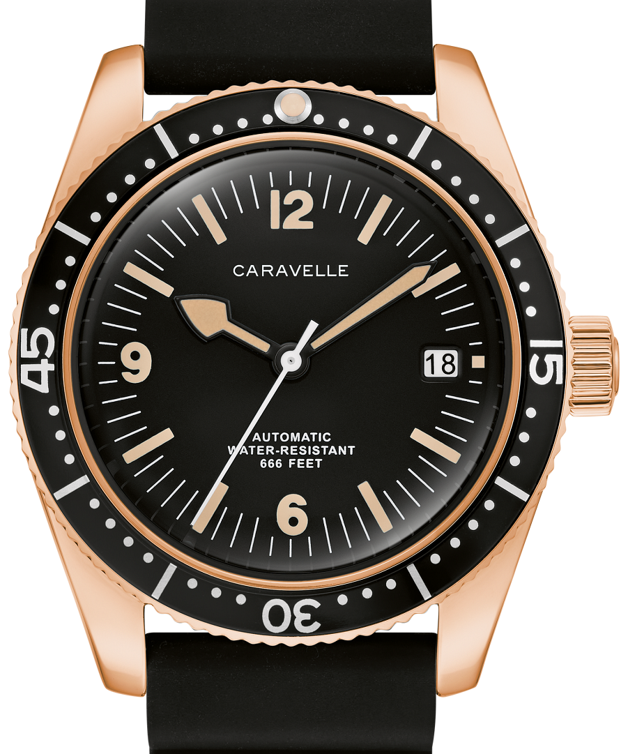 A Caravelle automatic dive watch with a black dial, black rubber strap, and a rose gold-tone case with a black rotating bezel.