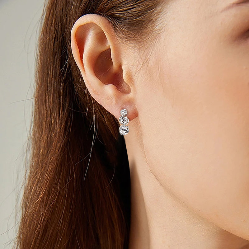 Moissanite Triple Stone Curve Earrings in Sterling Silver - Solomon Jewelers