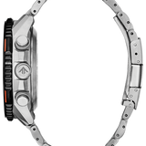 Close-up side view of a stainless steel watch with a metal link bracelet, featuring a black rotating bezel with an orange accent and silver pushers on a white background.