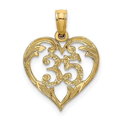 14K gold heart charm pendant, 35-inch length, elegant jewelry piece from Solomon Jewelers with detailed heart design.