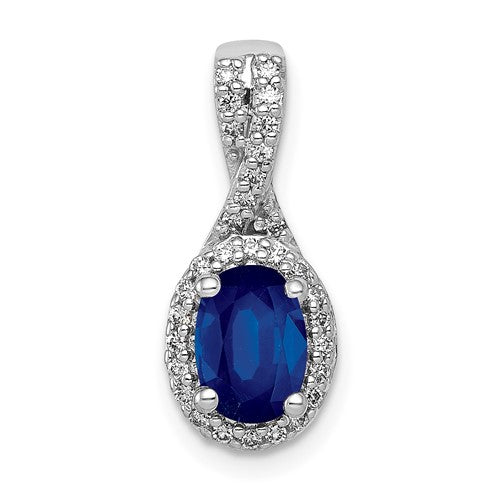 14k white gold diamond and oval sapphire halo pendant, featuring sparkling gemstones and elegant design.