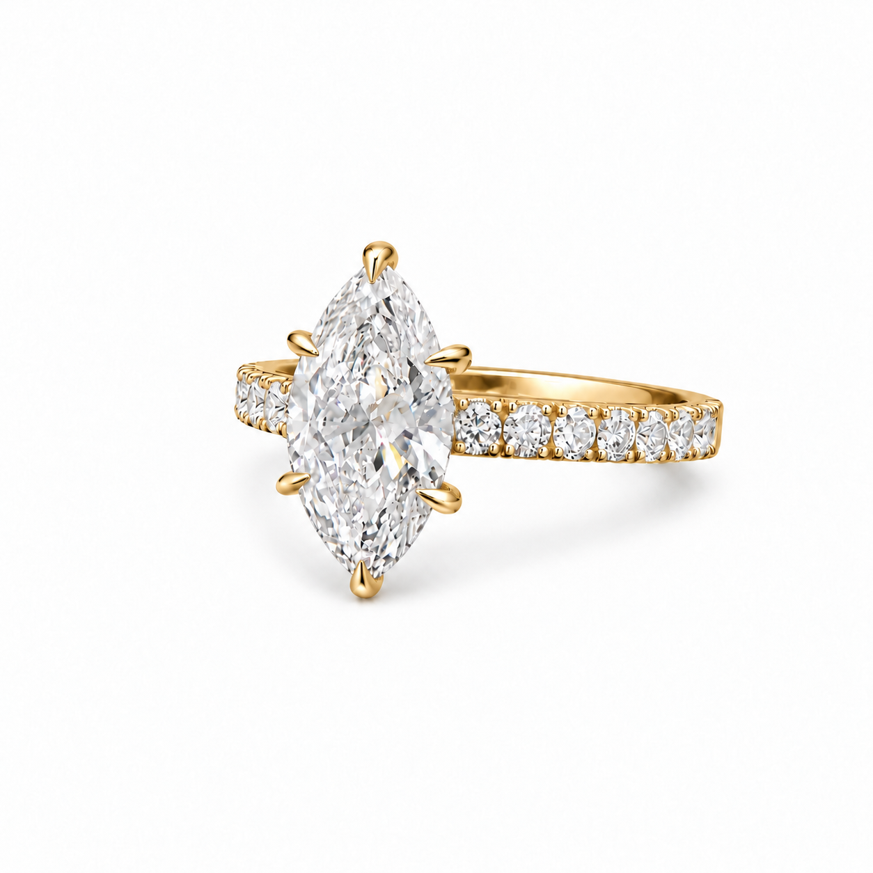 A yellow gold ring featuring a large marquise-cut diamond center stone and a pavé band set with small round diamonds, shown on a clean white background.