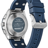 Citizen S-92 Search and Rescue watch shown from the back, featuring a silver stainless steel case with a blue silicone strap and a custom-engraved blue dial on the case back.