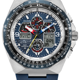 Citizen Topo Navigator II watch with a silver stainless steel case, a dark blue dial, a blue rubber strap, and a black bezel with white and red markings.
