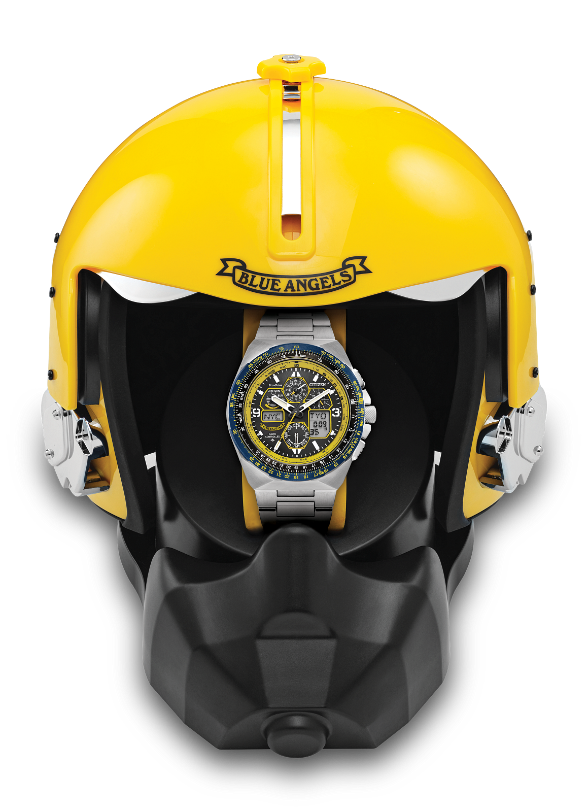 A wristwatch with a yellow and blue dial, displayed inside a yellow and black helmet-shaped presentation stand. The helmet features the text 'BLUE ANGELS' on the forehead.