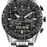 Citizen Eco-Drive G-Shock-style wristwatch with a large round stainless steel case, integrated metal link bracelet, black dial, and silver-tone bezel markings.