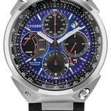 Citizen Eco-Drive Perpetual watch with a silver titanium case, blue and black dial, and a black perforated rubber strap.