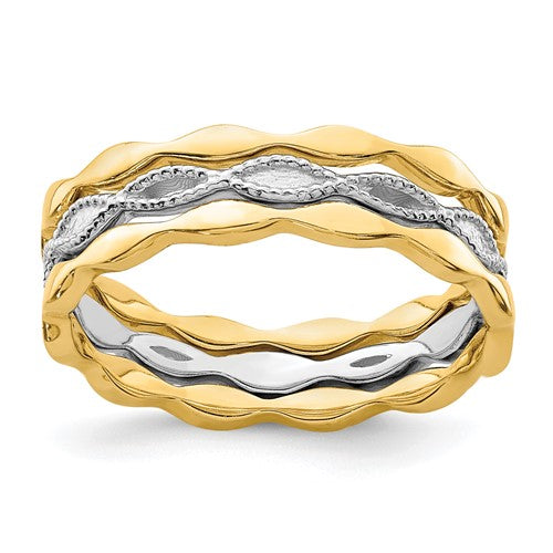 Set of three 14K yellow and white gold stackable rings from Solomon Jewelers, showcasing sleek, elegant jewelry with polished finishes.