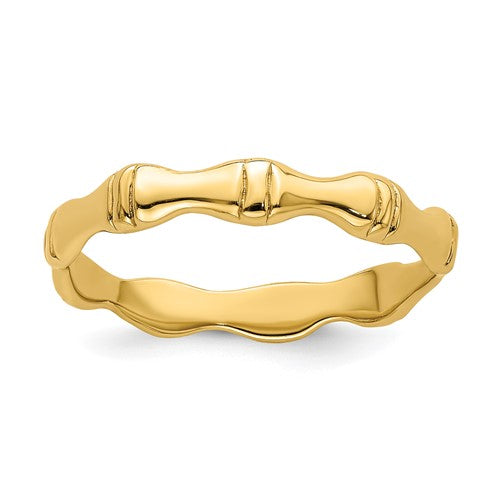 Polished 14k gold bamboo ring from Solomon Jewelers, showcasing a smooth, shiny textured band design.
