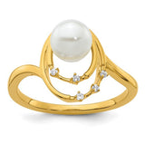 14K polished gold ring featuring oval diamonds and pearls, elegant jewelry piece with intricate design from Solomon Jewelers