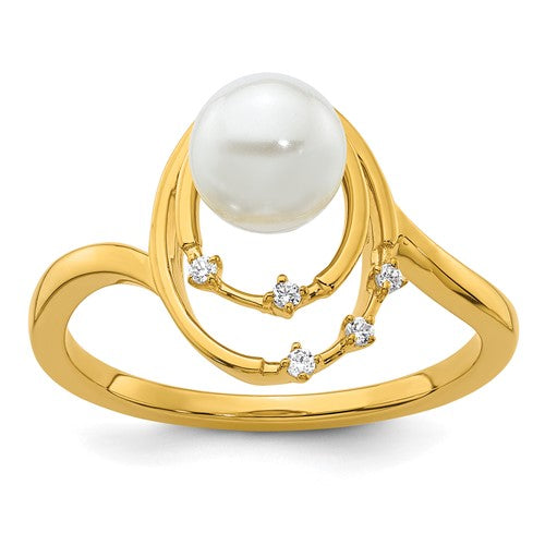 14K polished gold ring featuring oval diamonds and pearls, elegant jewelry piece with intricate design from Solomon Jewelers