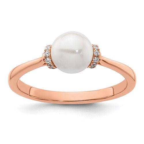 14K rose gold fashion ring with polished finish, diamond accents, and pearl embellishments from Solomon Jewelers.