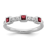 14K white gold ring with polished finish featuring diamonds and rubies, crafted by Solomon Jewelers.