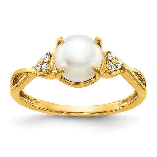 14k white gold pearl and diamond ring featuring elegant design, crafted by Solomon Jewelers.