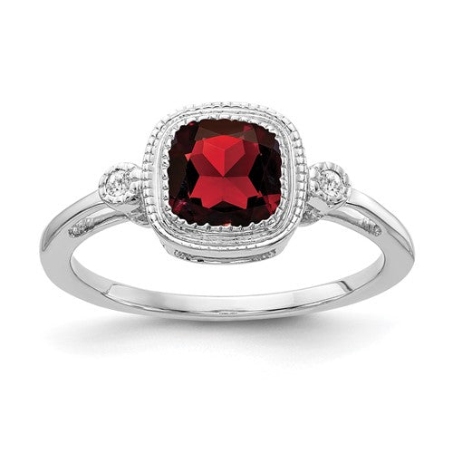 14k white gold cushion garnet and diamond ring with intricate detailing, crafted by Solomon Jewelers.