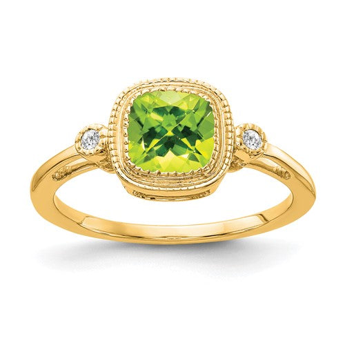 14k gold cushion peridot and diamond ring with intricate band design, featuring a vibrant green peridot gemstone.