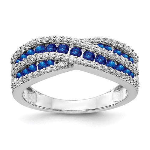 14k white gold ring featuring diamonds and sapphires, showcasing elegant jewelry design with sparkling gemstones.