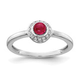 14k white gold ring with diamond accents and a cabochon ruby, showcasing elegant jewelry craftsmanship.