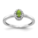 14k white gold ring with a large oval cabochon peridot and sparkling diamonds, featuring intricate Solomon Jewelers craftsmanship.