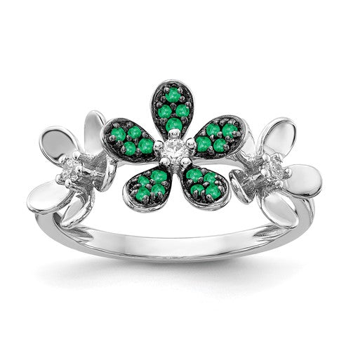 14k white gold flower ring with diamonds and emeralds, featuring intricate gemstone detailing and elegant craftsmanship.