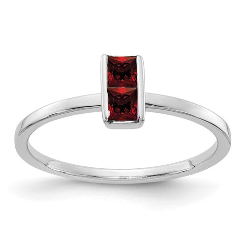 14k white gold Garnet ring featuring a vibrant red gemstone set in a delicate Solomon Jewelers band.