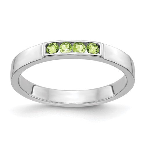 14k white gold ring with four peridot gemstones, elegant jewelry band featuring vibrant green stones and intricate design.