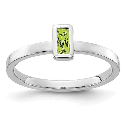 14k white gold Peridot ring with bezel-set gemstone, elegant jewelry piece featuring a vibrant green peridot stone.