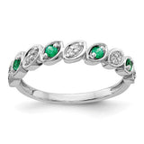 14k white gold ring with fancy diamonds and emeralds, featuring intricate jewelry design by Solomon Jewelers.