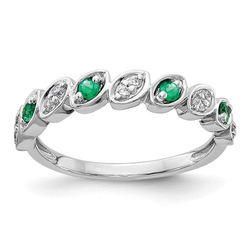 14k white gold ring with fancy diamonds and emeralds, featuring intricate jewelry design by Solomon Jewelers.