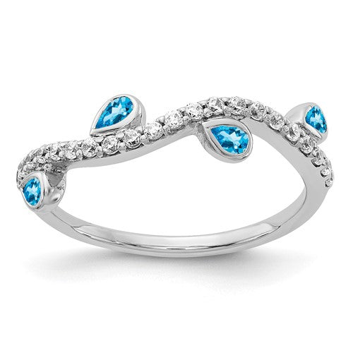 14k white gold diamond and pear-shaped blue topaz curved ring featuring sparkling stones and elegant design.