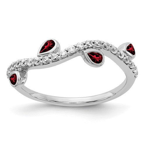 14k white gold ring featuring diamonds and pear-shaped garnets in a curved design, crafted by Solomon Jewelers.