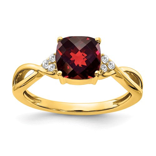 14k gold checkerboard garnet and diamond ring with intricate design, featuring sparkling gemstones and a polished band.