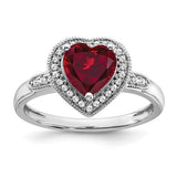 14k white gold heart-shaped ruby and diamond halo ring, elegant jewelry piece with sparkling stones and intricate design.