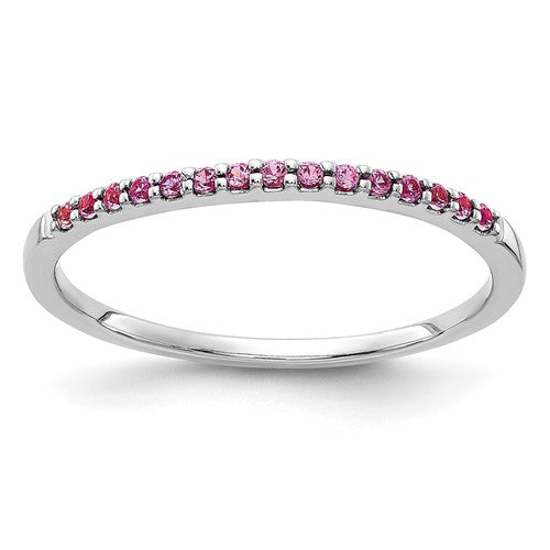 14k white gold pink sapphire ring with a row of sparkling pink sapphires, elegant jewelry ring by Solomon Jewelers.