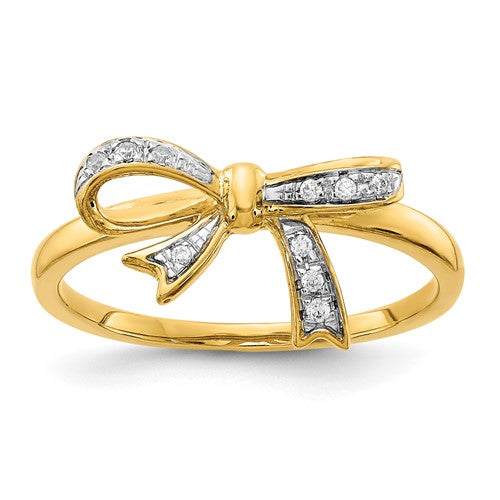 14k white gold diamond bow ring with rhodium plating, featuring sparkling diamonds, from Solomon Jewelers.