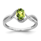 14k white gold oval peridot and diamond twist ring showcasing vibrant gemstone and sparkling accents from Solomon Jewelers.