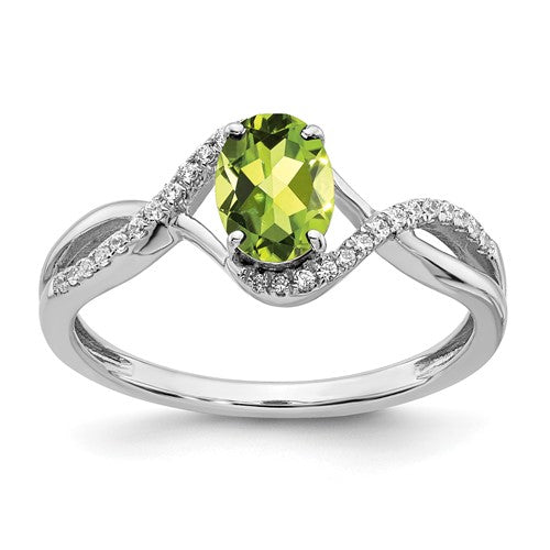 14k white gold oval peridot and diamond twist ring showcasing vibrant gemstone and sparkling accents from Solomon Jewelers.